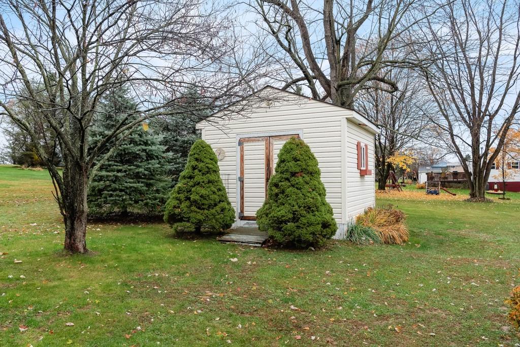 60 Fezell Road Freedom, PA 15042 - Photo 21 of 21 a front view of a house with garden