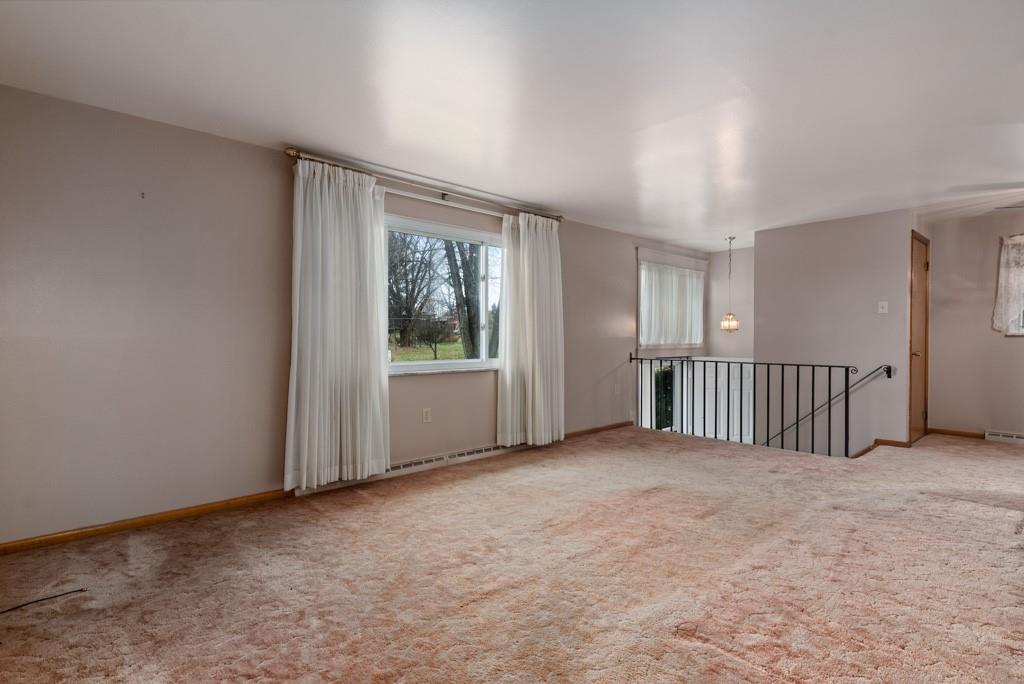 60 Fezell Road Freedom, PA 15042 - Photo 4 of 21 a view of an empty room with a window