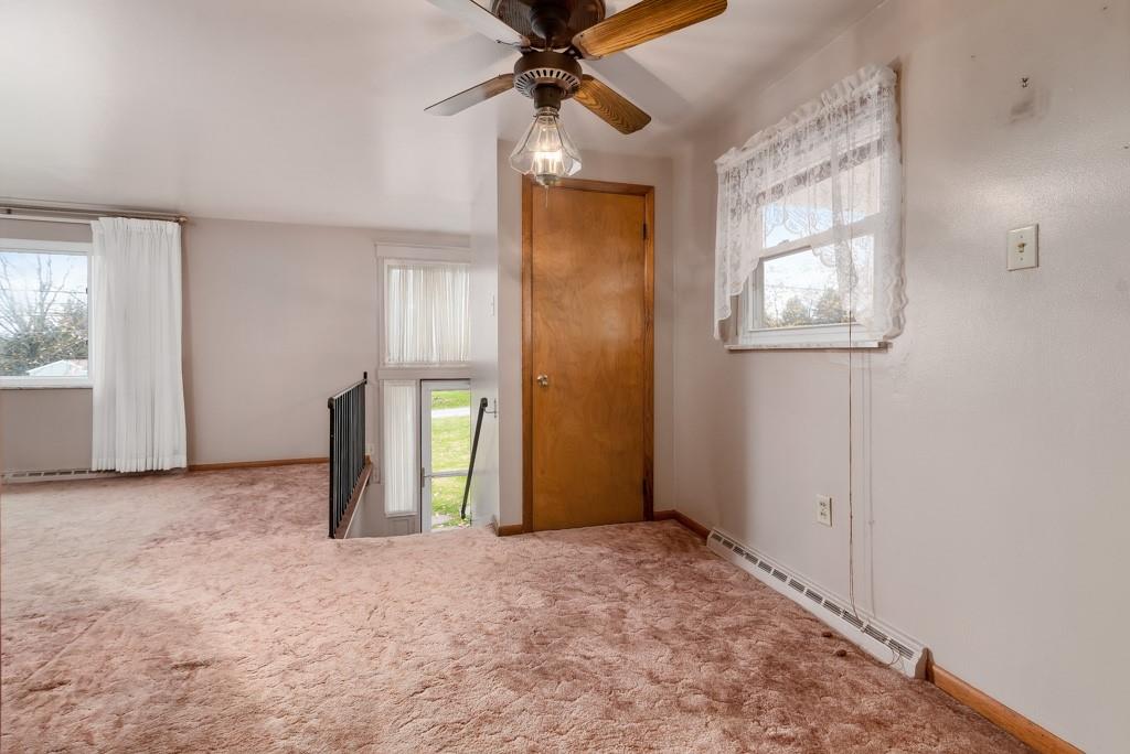 60 Fezell Road Freedom, PA 15042 - Photo 9 of 21 an empty room with windows and fan