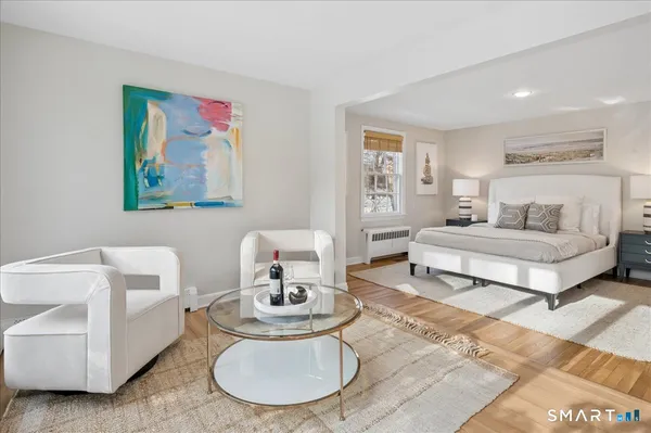 a living room with furniture and a table