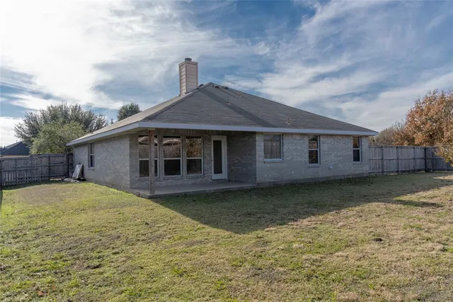 a house view with a garden space