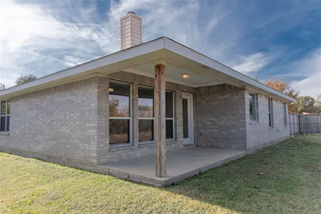 a front view of a house with a porch