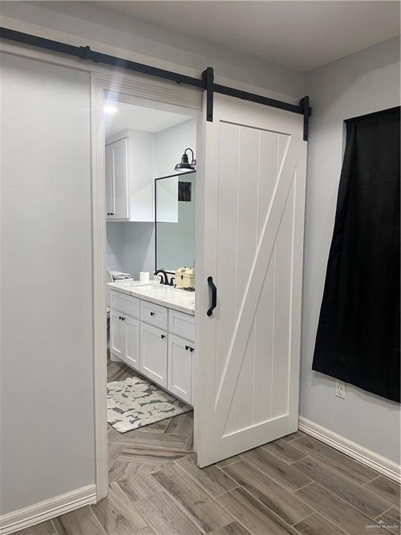 814 North Flag Street Pharr, TX 78577 - Photo 12 of 16 a view of kitchen with stainless steel appliances cabinets and wooden floor