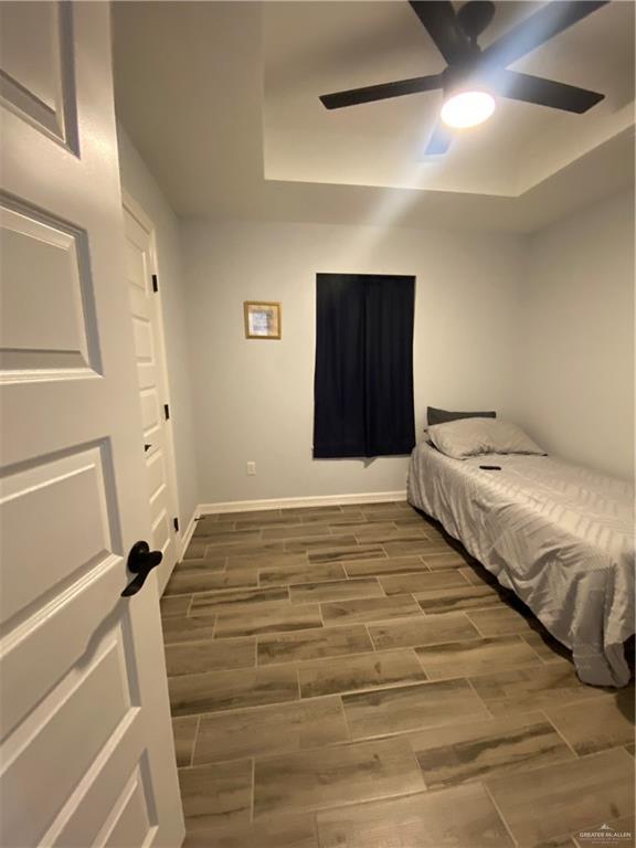 814 North Flag Street Pharr, TX 78577 - Photo 10 of 16 a bedroom with a bed and a window