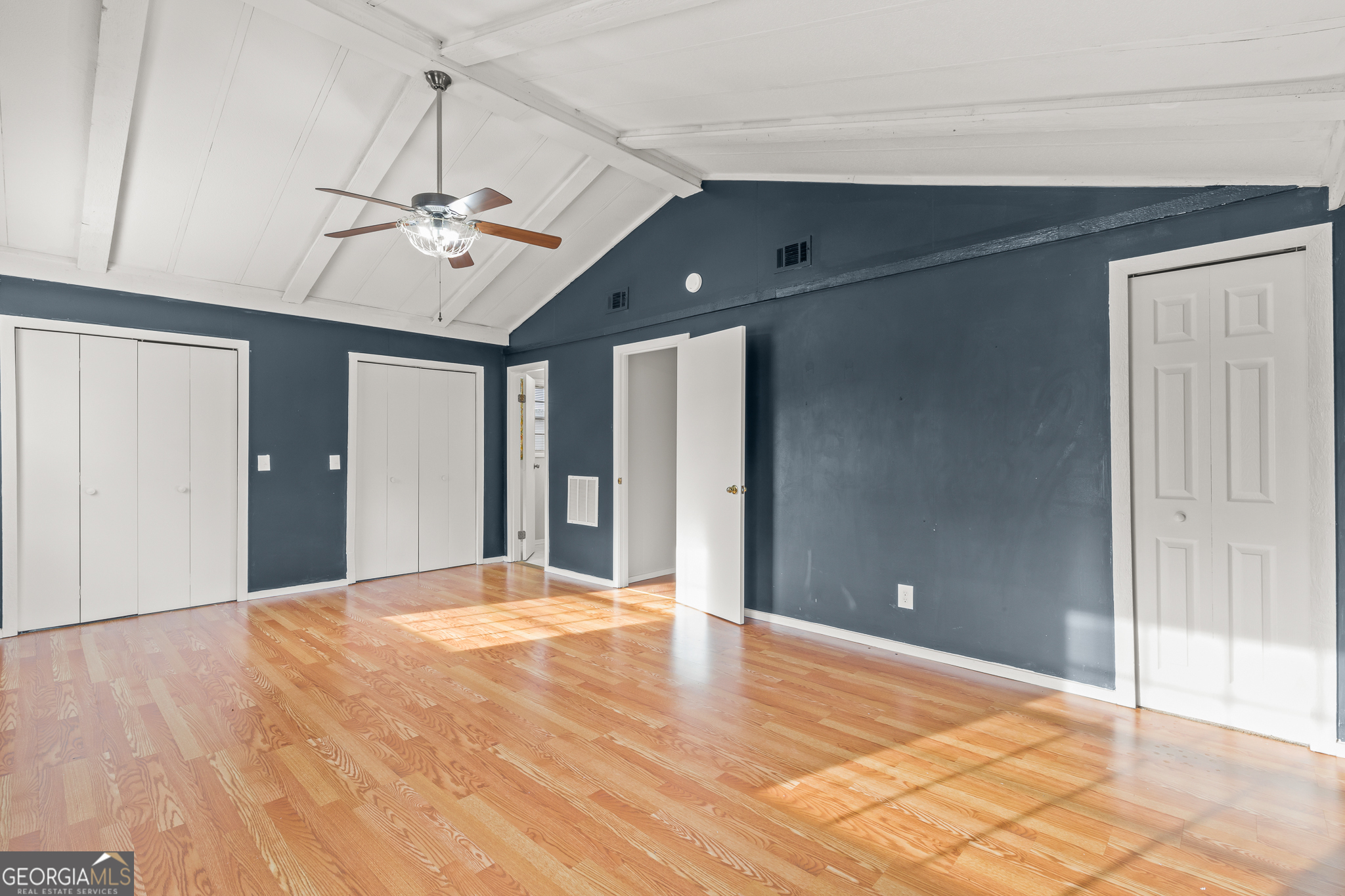 115 Valley View Court Tyrone, GA 30290 - Photo 12 of 15 a view of an empty room with a chandelier fan