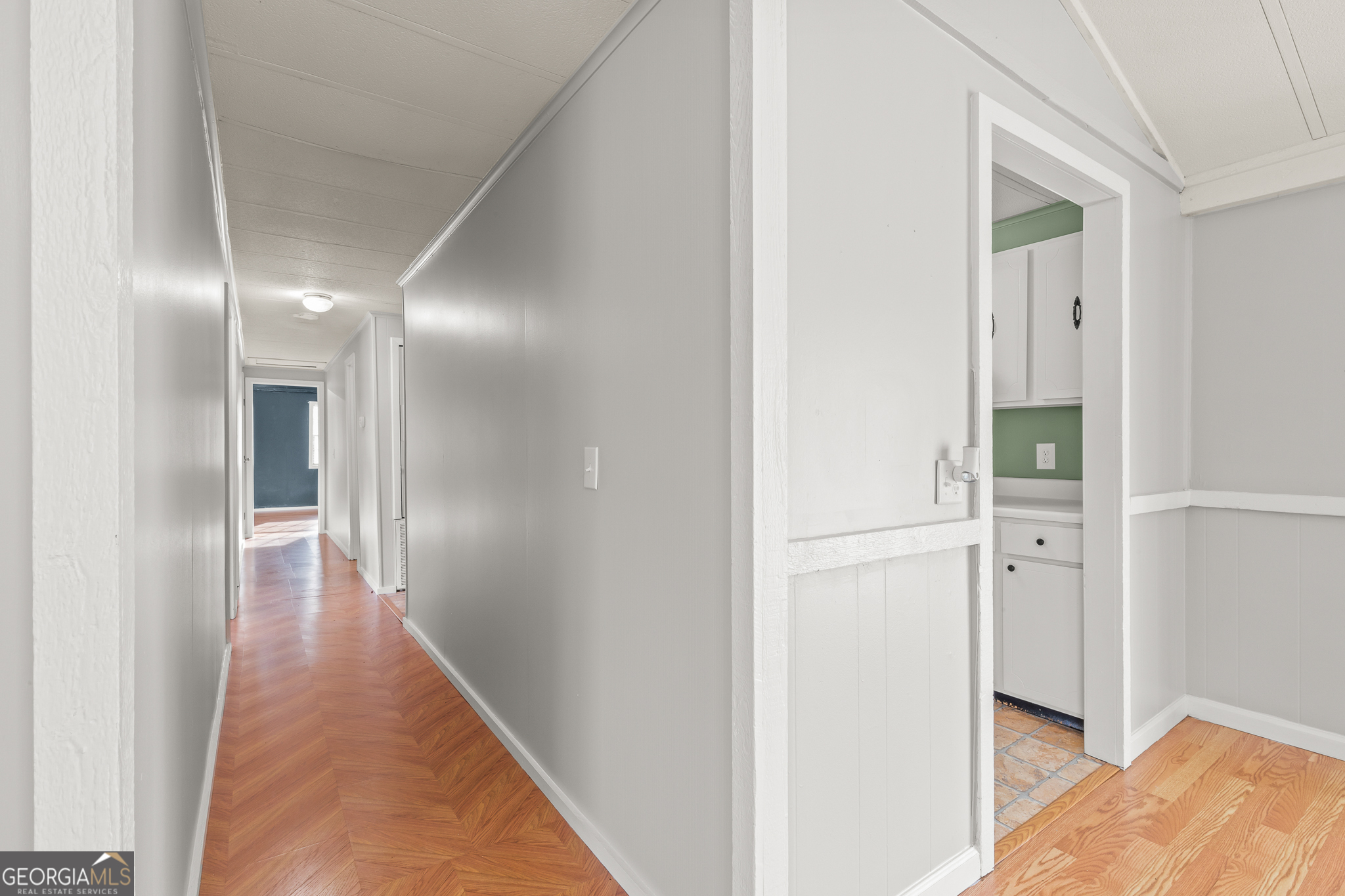 115 Valley View Court Tyrone, GA 30290 - Photo 8 of 15 a view of hallway with wooden floor