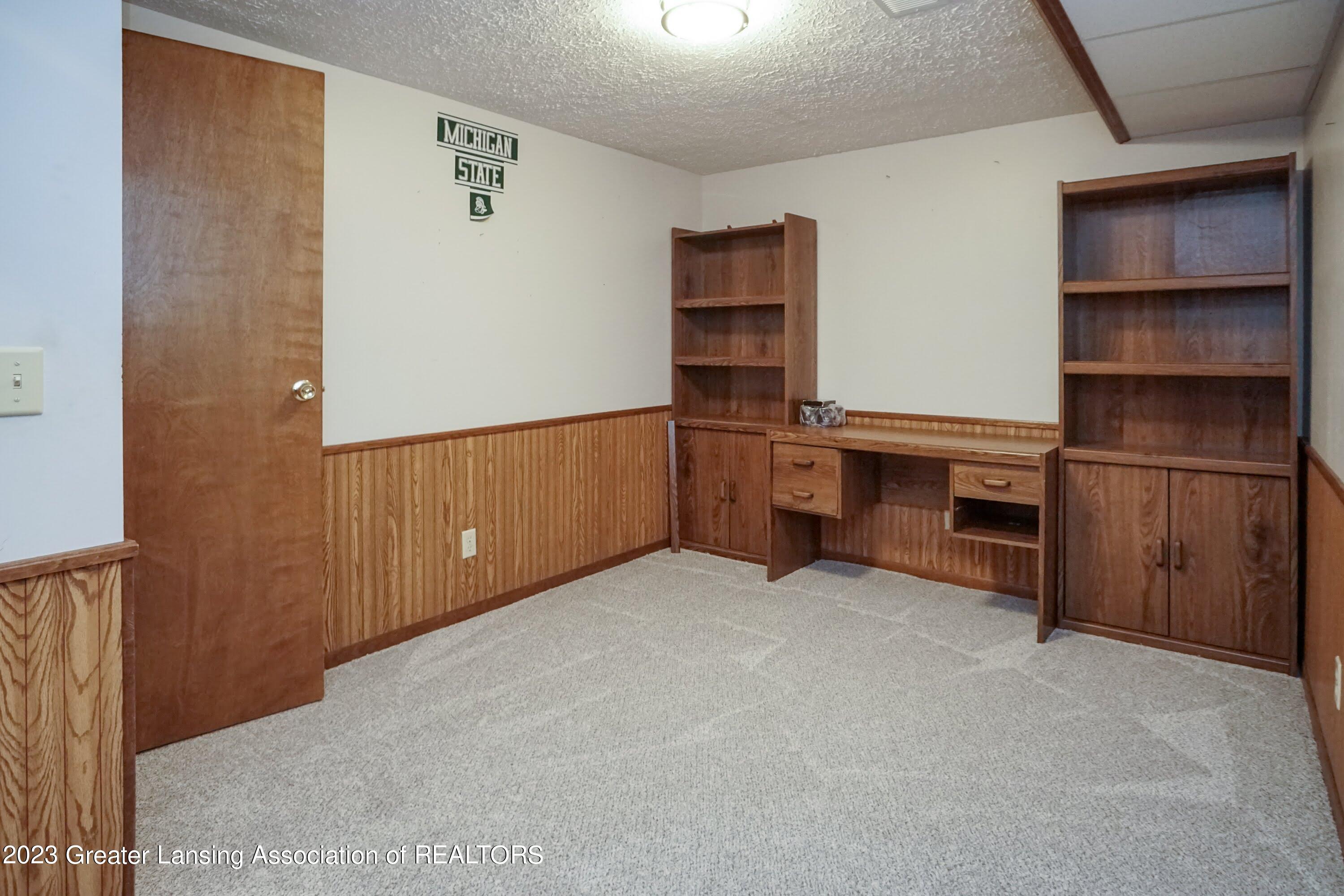 5872 Green Road Haslett, MI 48840 - Photo 23 of 31 Flex Rm Basement 1