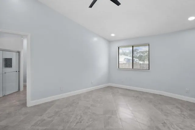 an empty room with windows