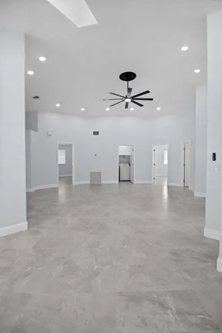 a view of a livingroom with a ceiling fan