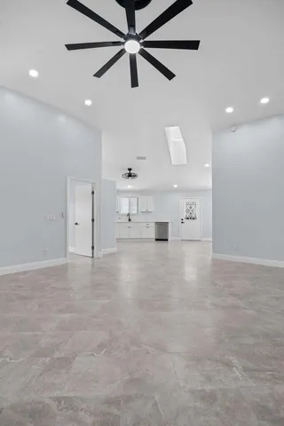a view of a refrigerator and window