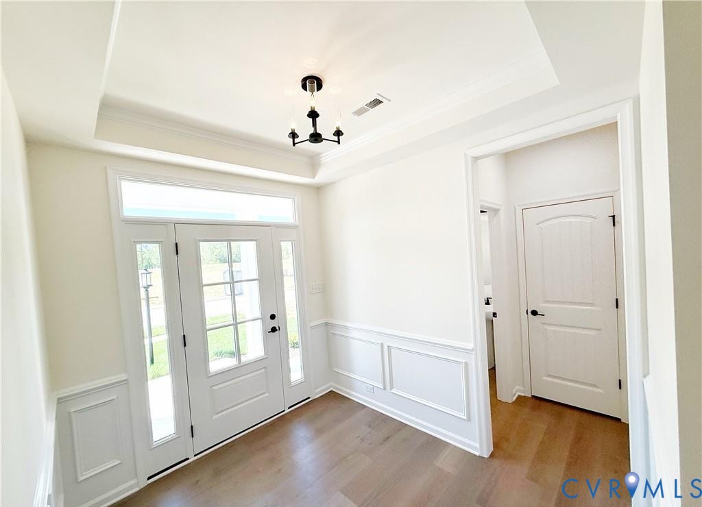 15124 Bishops Run Court Chesterfield, VA 23120 - Photo 3 of 29 wooden floor in an empty room with a window