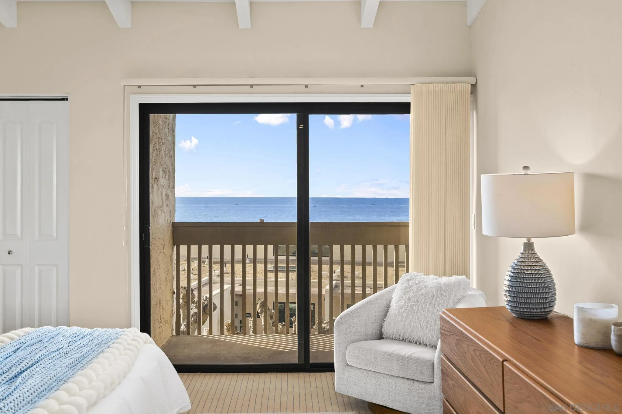 429 South Sierra Avenue, Unit 328 Solana Beach, CA 92075 - Photo 28 of 43 a bedroom with furniture and a window