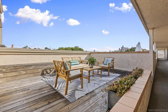 a view of a terrace with seating area