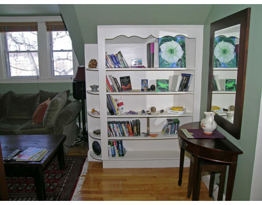57 Cummings Road, Unit 3 Boston, MA 02135 - Photo 8 of 12 a living room with furniture and a window