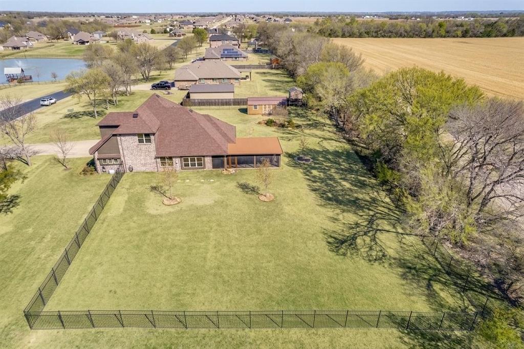 1215 Firefly Ridge Blue Ridge, TX 75424 - Photo 2 of 30 Gorgeous stocked fishing pond and pier just minutes from your front door.