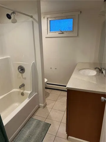 a bathroom with a sink and a bathtub