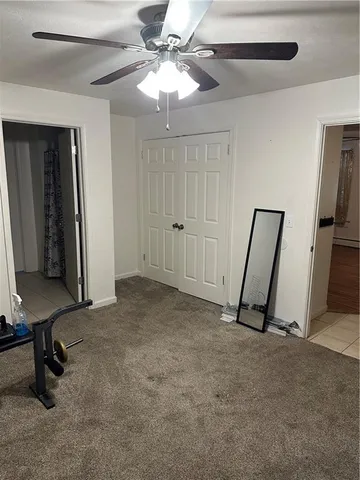 a view of a livingroom with a ceiling fan