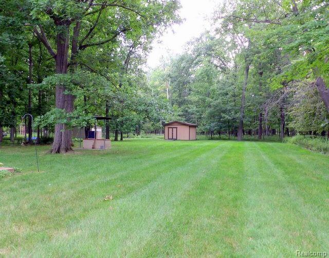 8750 Rucker Road Grosse Ile, MI 48138 - Photo 8 of 54 NO NEIGHBORS BEHIND YOU (BACKS UP TO WOODS)!