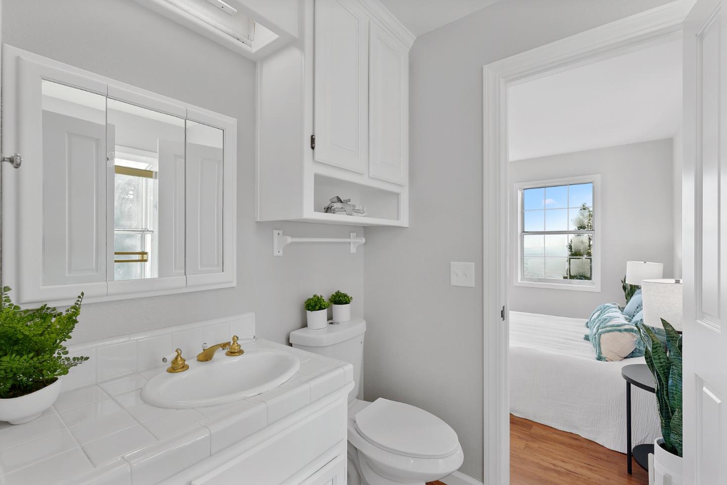 16505 Finley Ridge Road Morgan Hill, CA 95037 - Photo 17 of 44 a bathroom with a sink toilet and shower