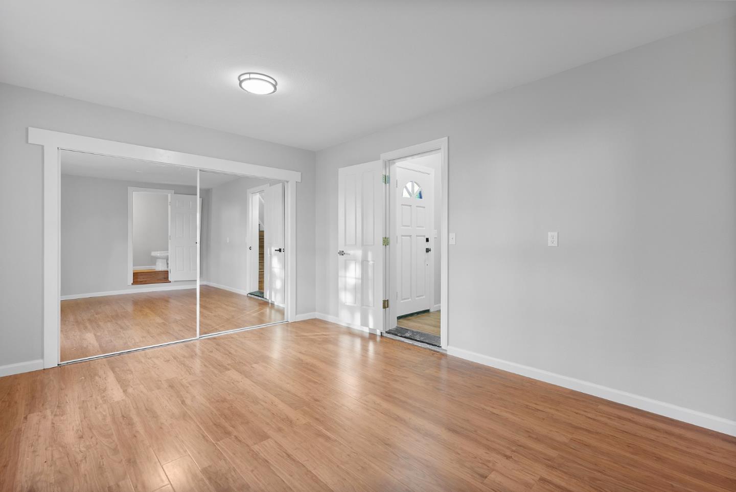 16505 Finley Ridge Road Morgan Hill, CA 95037 - Photo 20 of 44 a view of empty room with wooden floor
