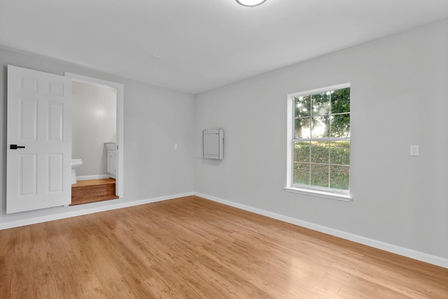 16505 Finley Ridge Road Morgan Hill, CA 95037 - Photo 21 of 44 wooden floor and windows in a room