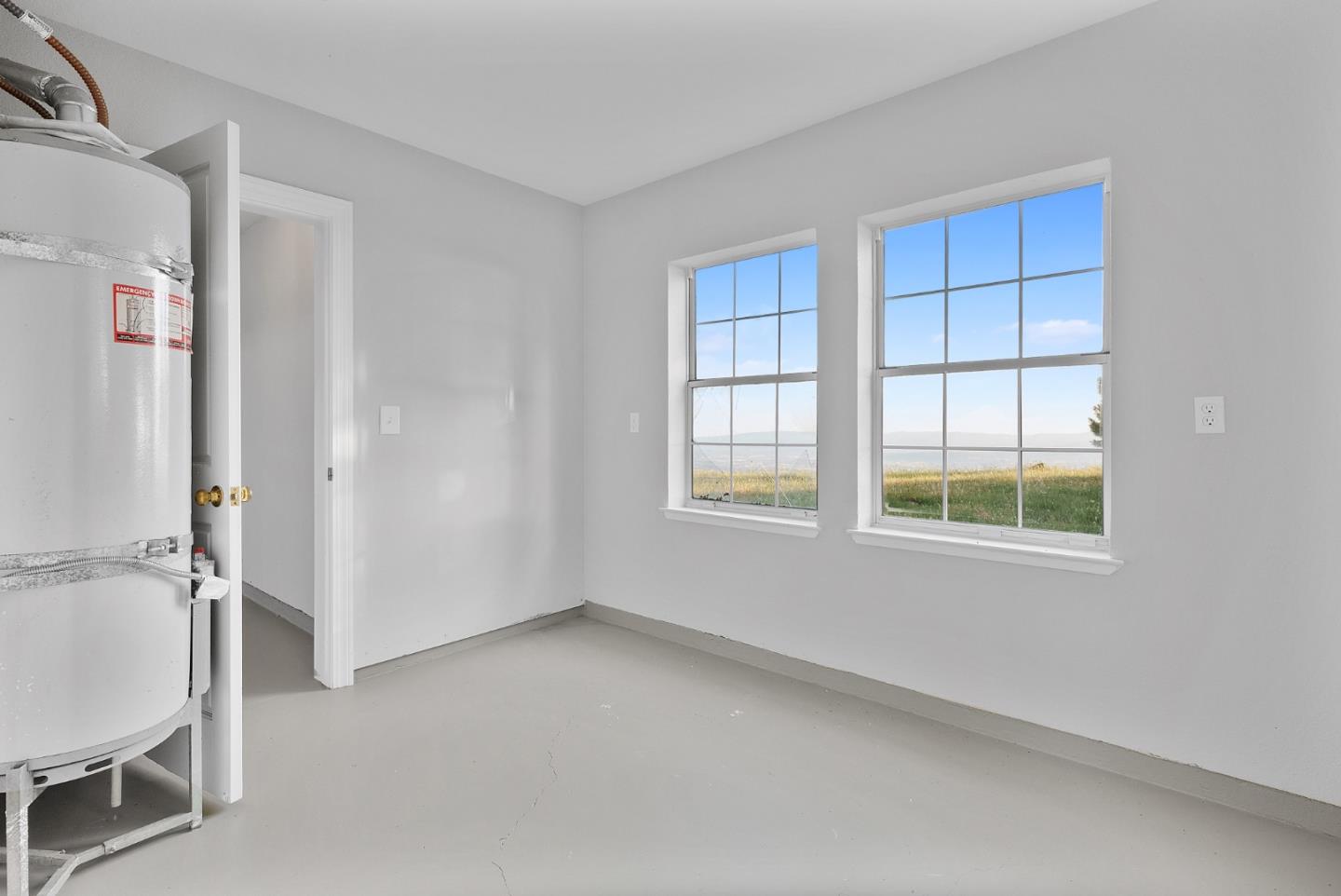 16505 Finley Ridge Road Morgan Hill, CA 95037 - Photo 25 of 44 an empty room with windows