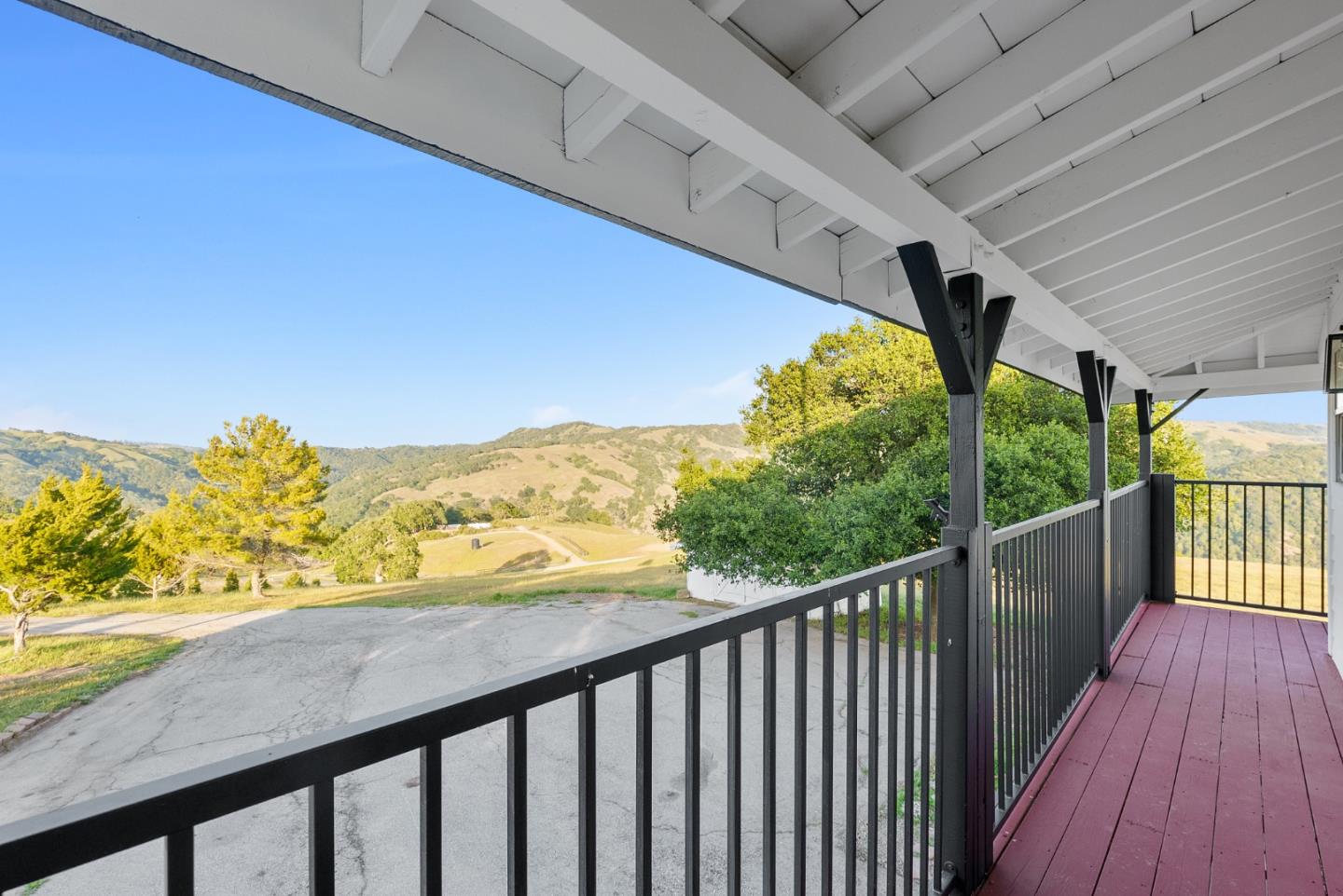 16505 Finley Ridge Road Morgan Hill, CA 95037 - Photo 27 of 44 a view of a balcony with wooden floor and a terrace