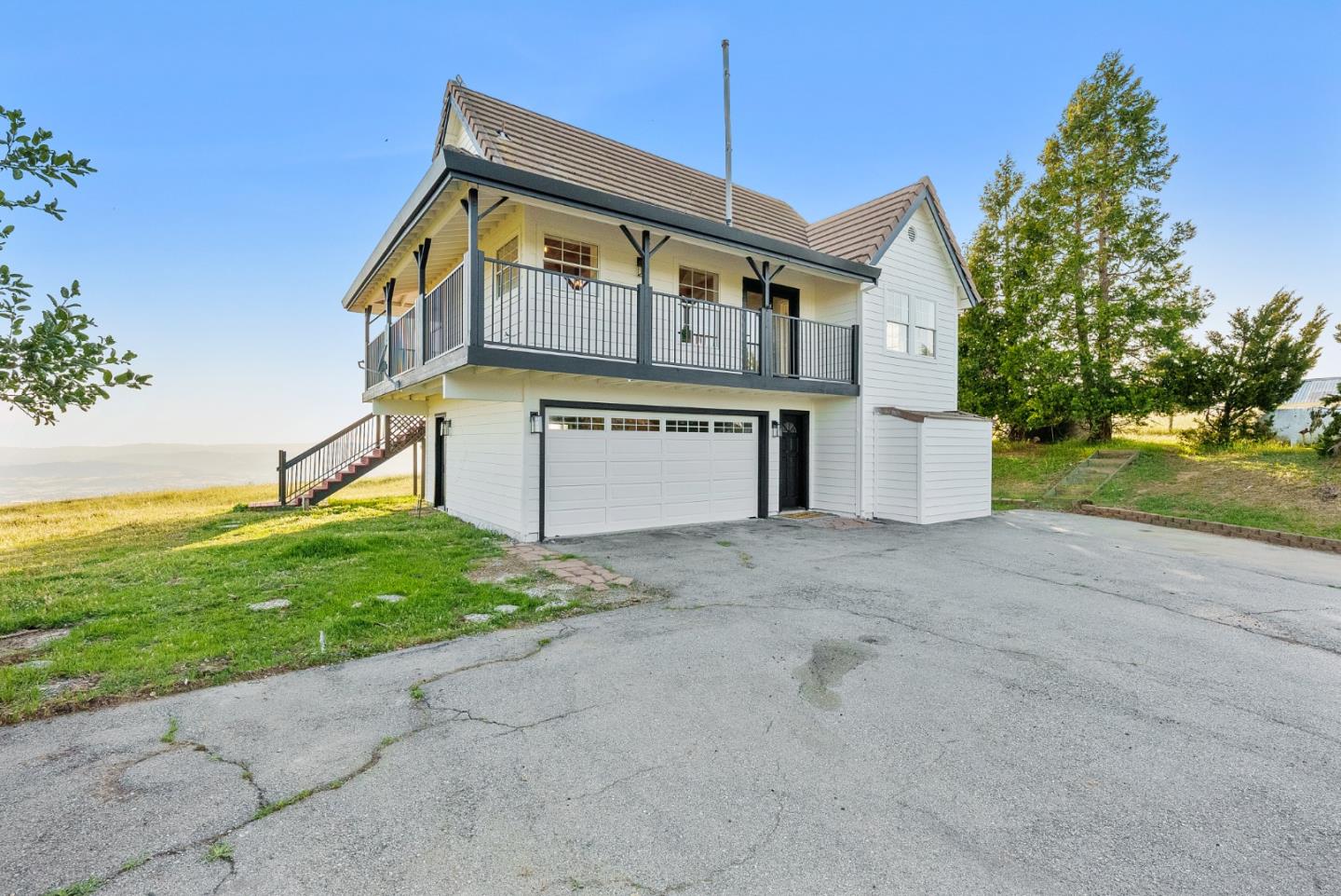 16505 Finley Ridge Road Morgan Hill, CA 95037 - Photo 34 of 44 a front view of a house with a yard