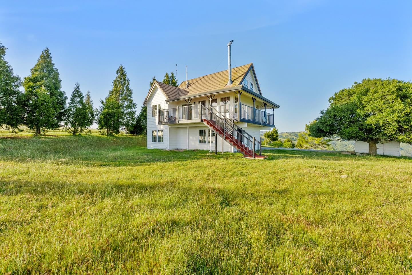 16505 Finley Ridge Road Morgan Hill, CA 95037 - Photo 35 of 44 a view of a house with a yard and swimming pool