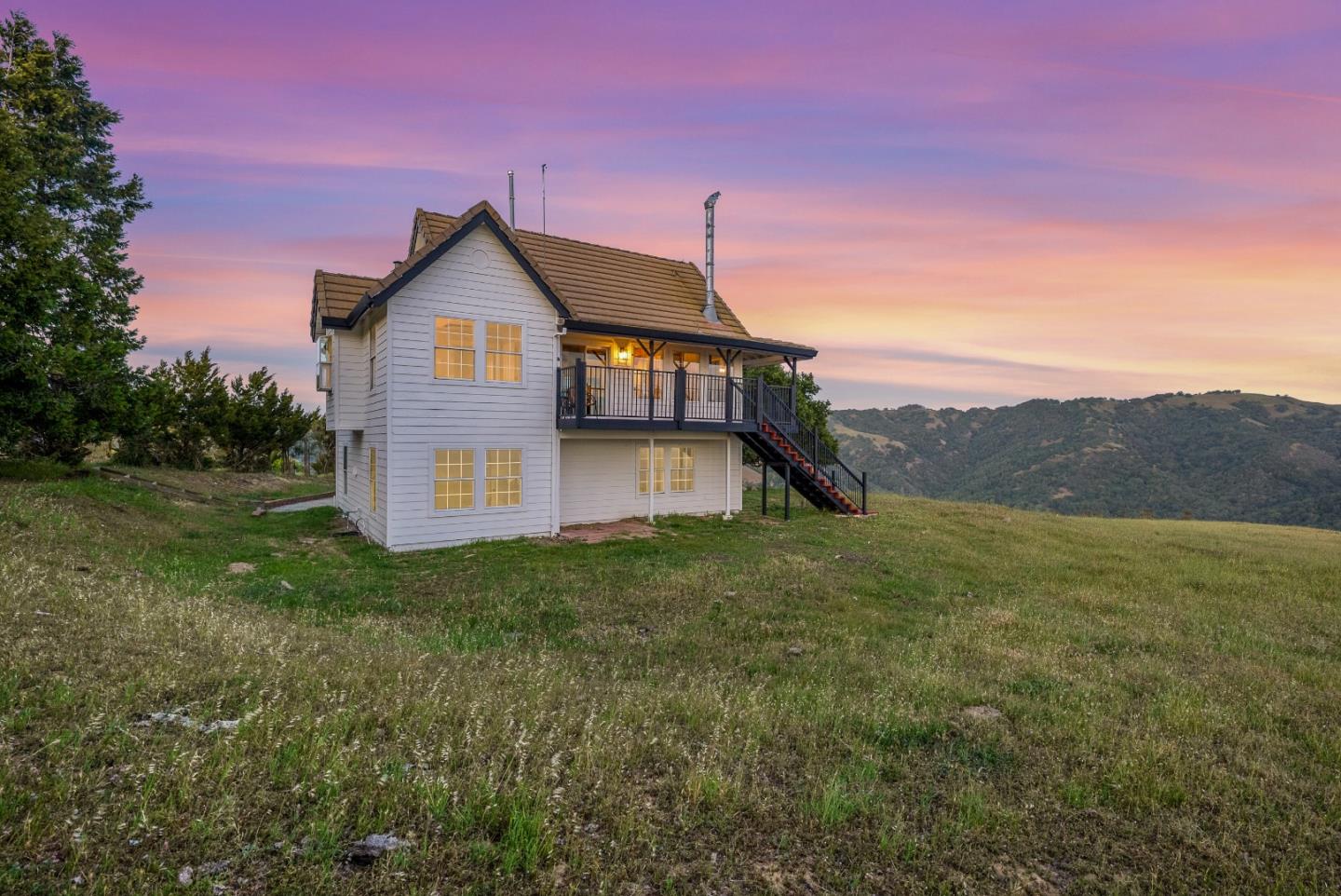16505 Finley Ridge Road Morgan Hill, CA 95037 - Photo 5 of 44 a view of a house with a big yard and large tree