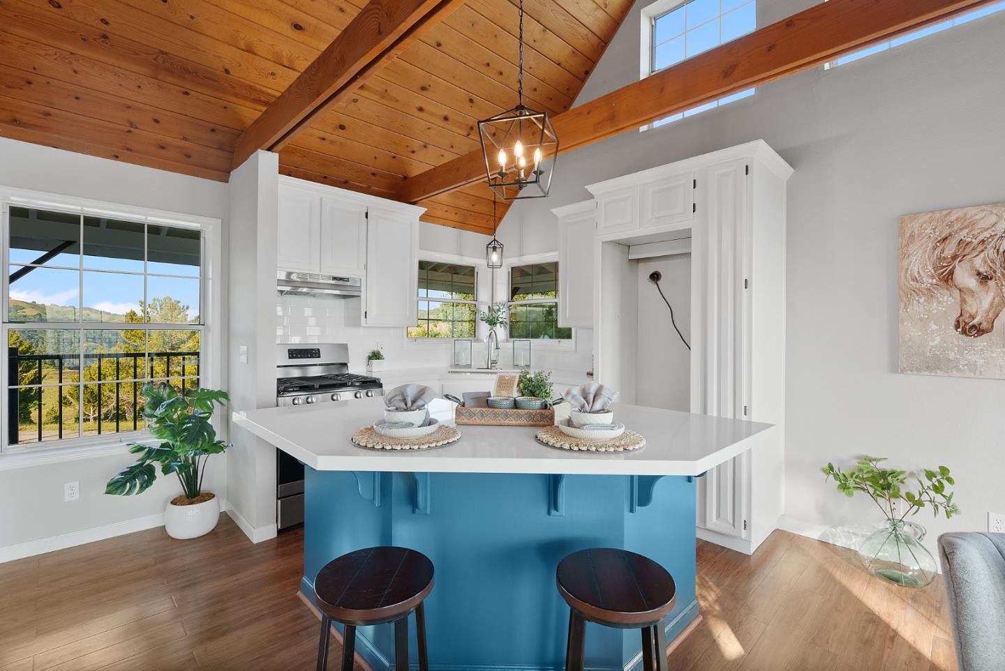 16505 Finley Ridge Road Morgan Hill, CA 95037 - Photo 8 of 44 a view of a dining room with furniture a chandelier and wooden floor
