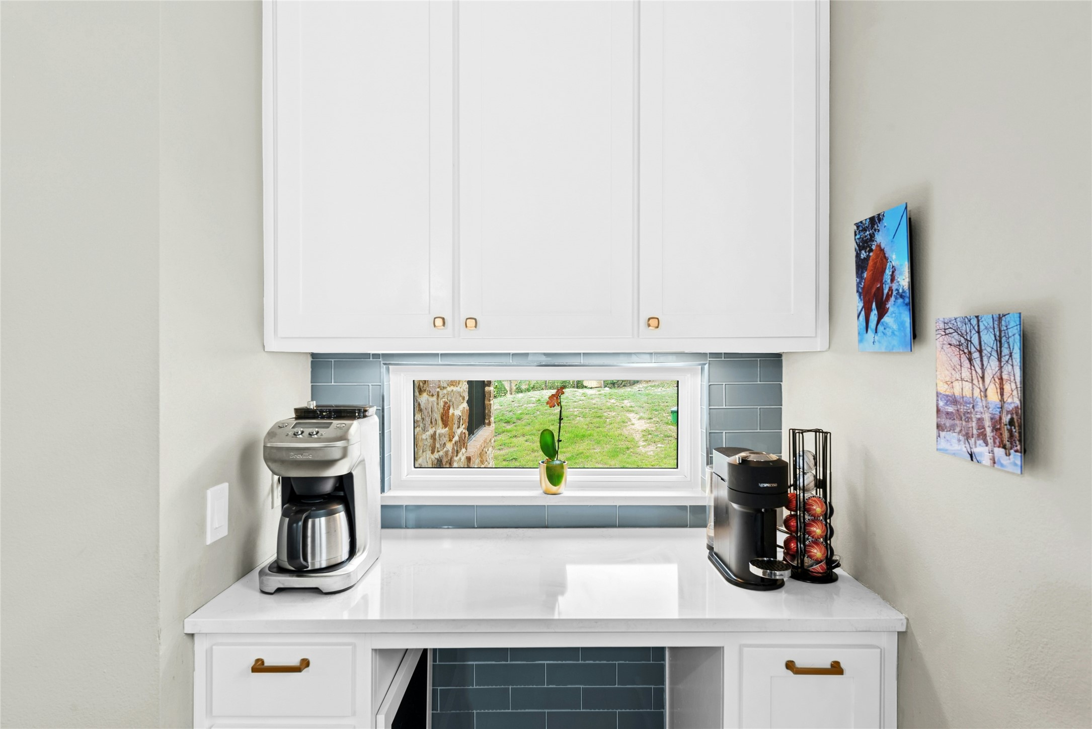279 Rugged Earth Drive Austin, TX 78737 - Photo 20 of 40 a kitchen with a sink a stove and cabinets