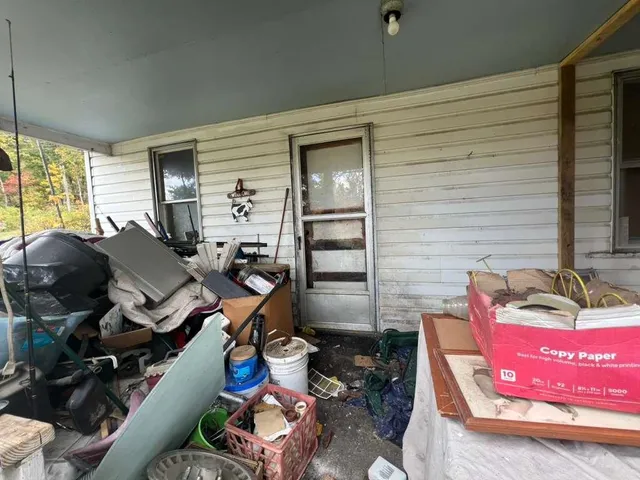 a room with furniture and a window