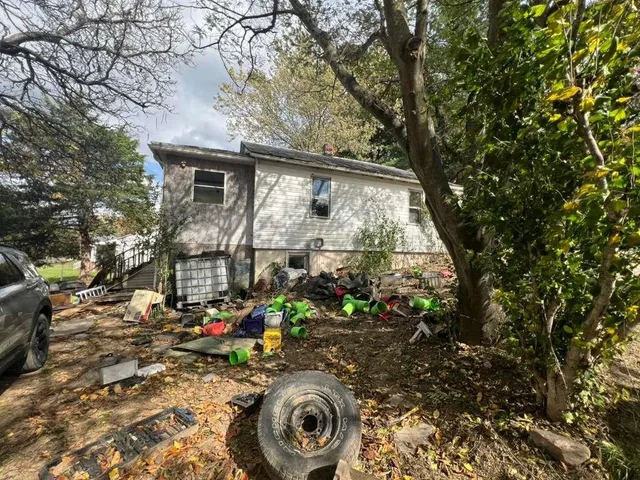 a backyard of a house with lots of green space