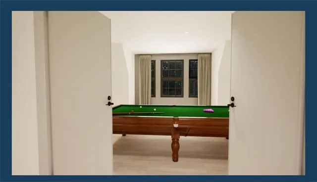 a en suite bathroom with a sink and a mirror