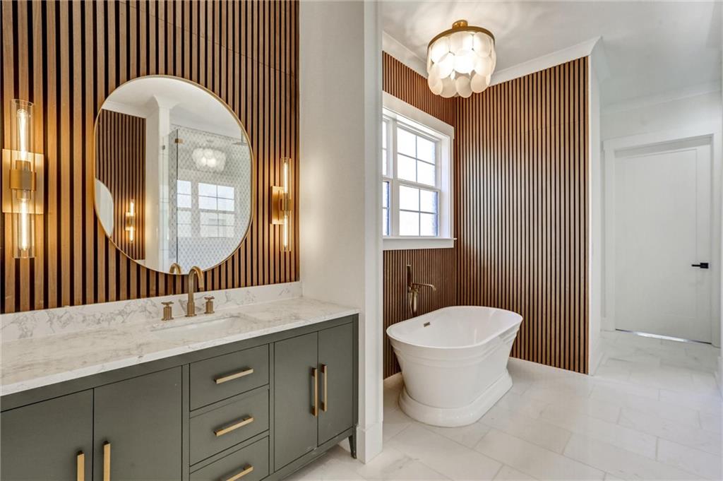 6113 Deepwater Cove Gainesville, GA 30506 - Photo 28 of 82 a bathroom with a toilet a sink and mirror