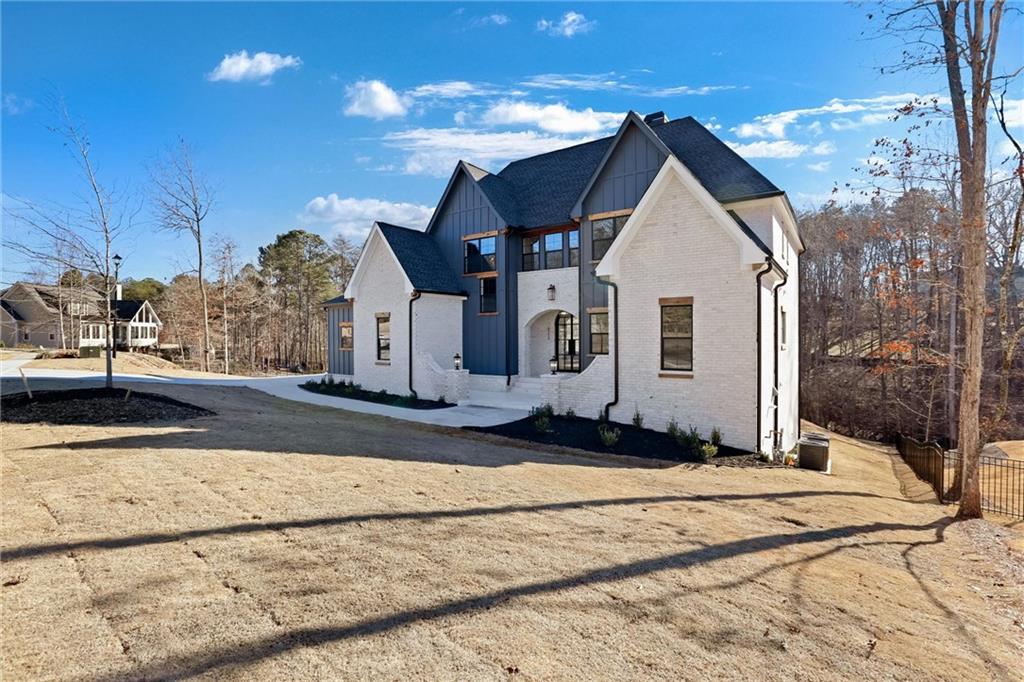 6113 Deepwater Cove Gainesville, GA 30506 - Photo 3 of 82 a view of a house with snow on the road