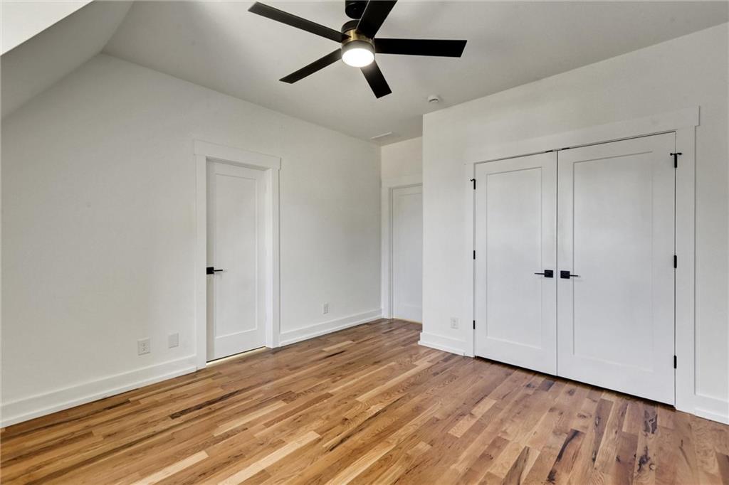 6113 Deepwater Cove Gainesville, GA 30506 - Photo 58 of 82 a view of empty room with wooden floor
