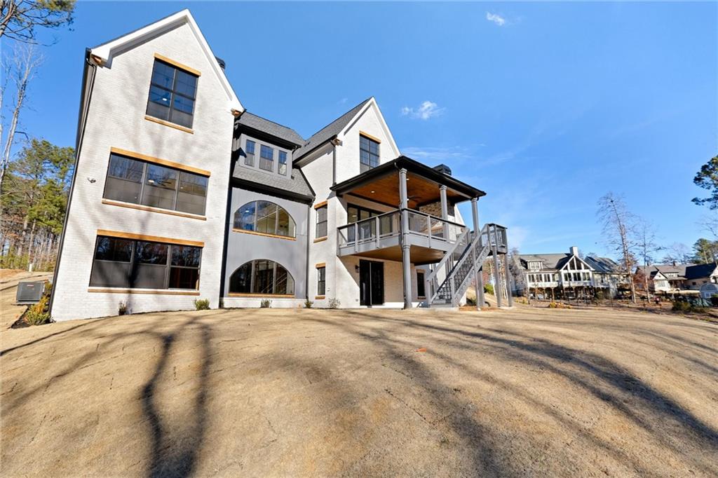 6113 Deepwater Cove Gainesville, GA 30506 - Photo 67 of 82 a front view of a building with a street