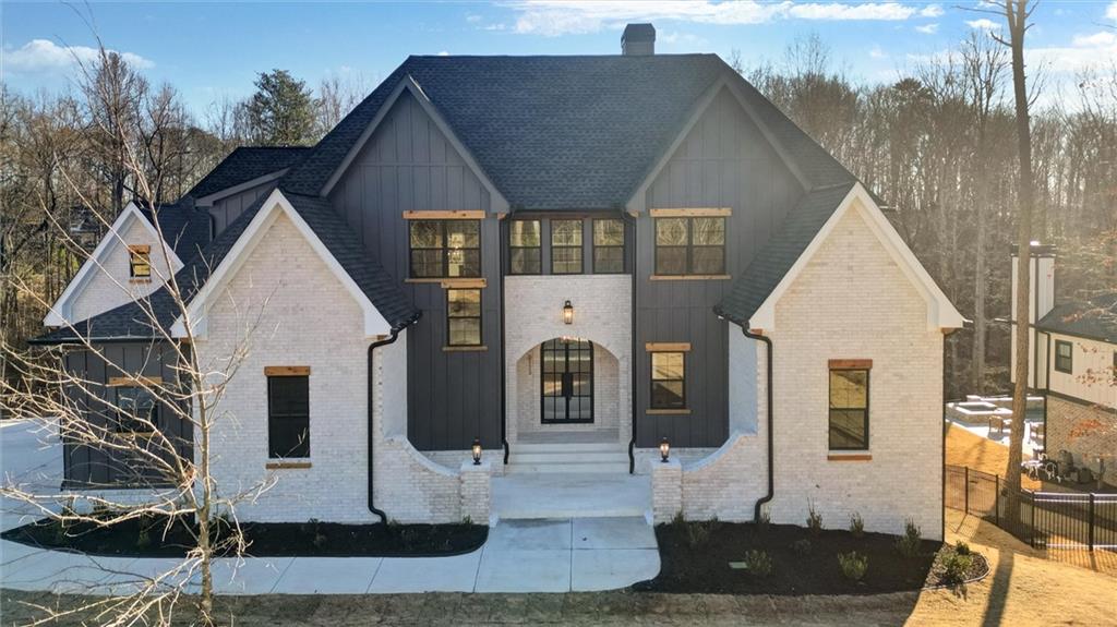 6113 Deepwater Cove Gainesville, GA 30506 - Photo 72 of 82 a front view of a house with a yard