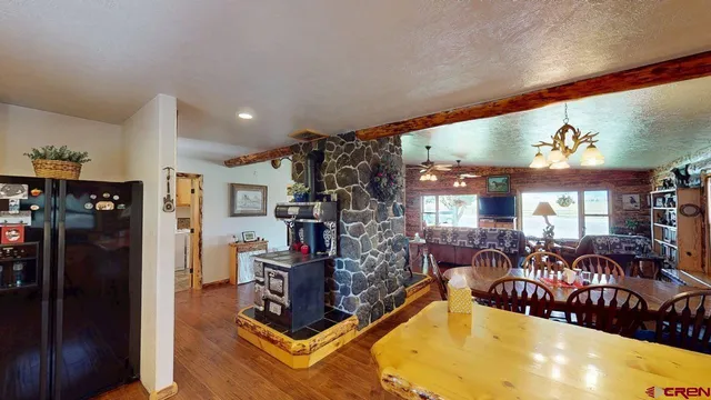 a view of a living room and kitchen