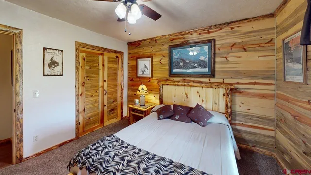 a wooden floor with some trees in front of it
