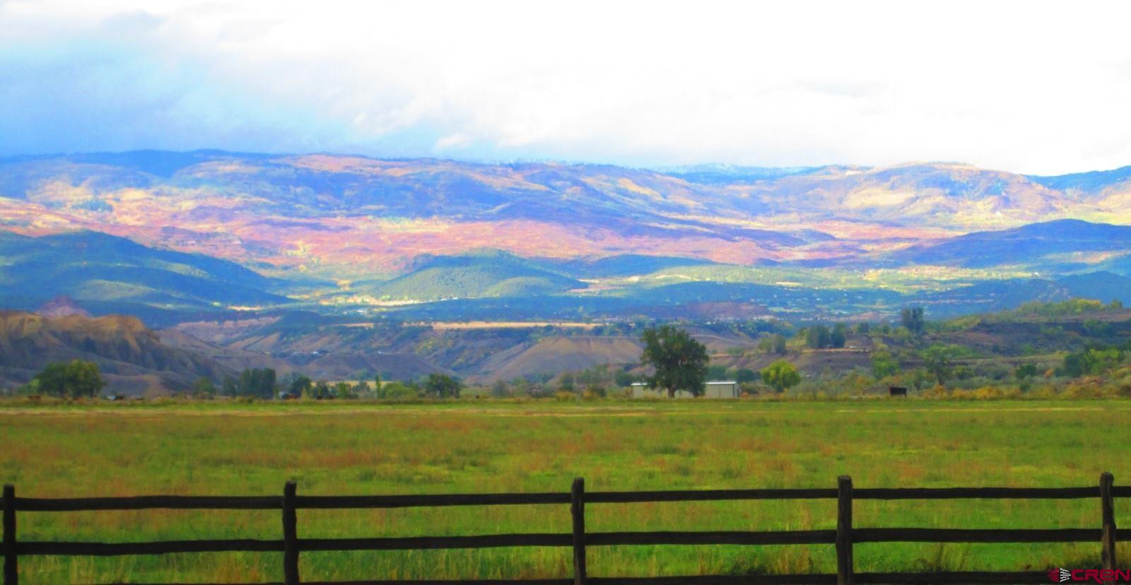 11694 Trap Club Road Austin, CO 81410 - Photo 42 of 45 a view of an ocean and a building