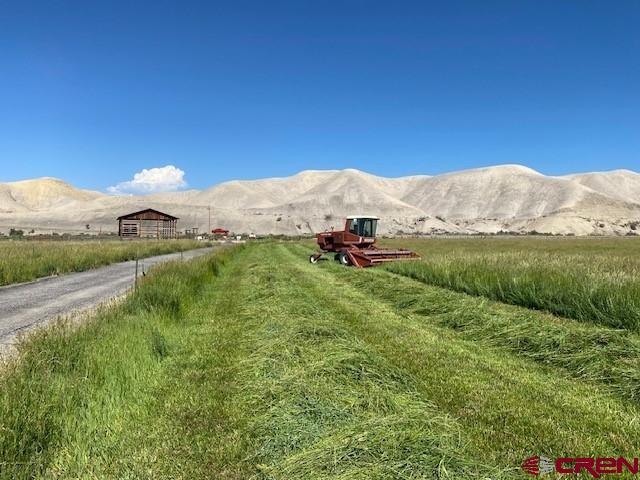 11694 Trap Club Road Austin, CO 81410 - Photo 5 of 45 a view of an outdoor space and mountain view