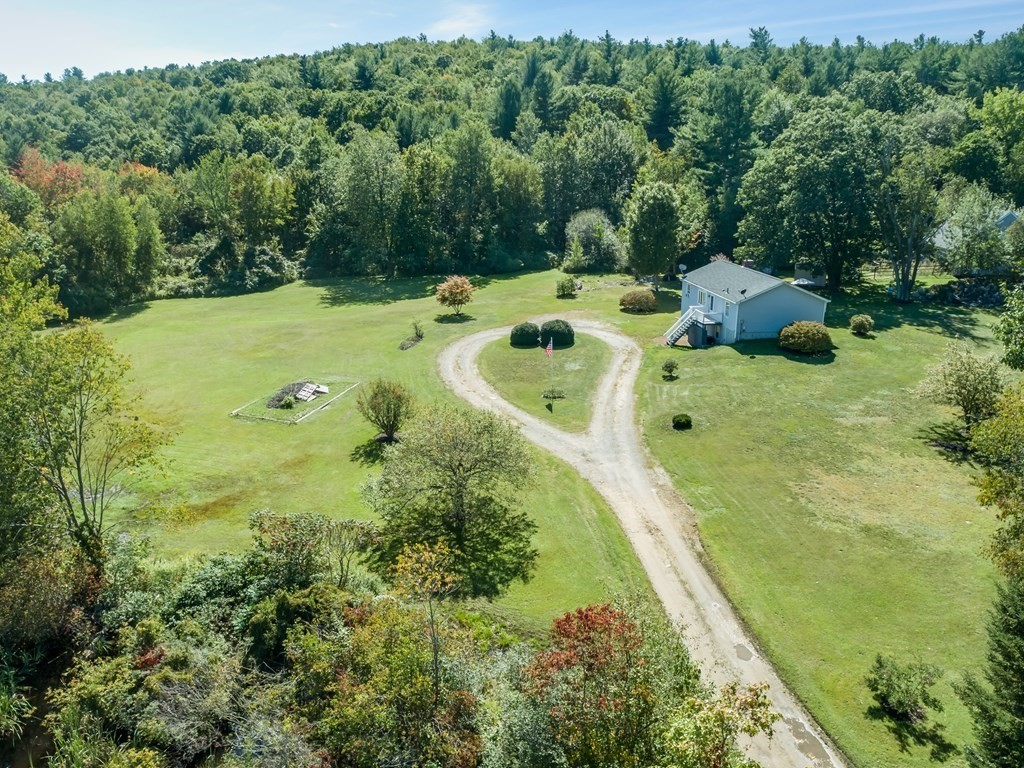 281 Brooks Station Road Princeton, MA 01541 - Photo 1 of 42 a view of a swimming pool and a yard