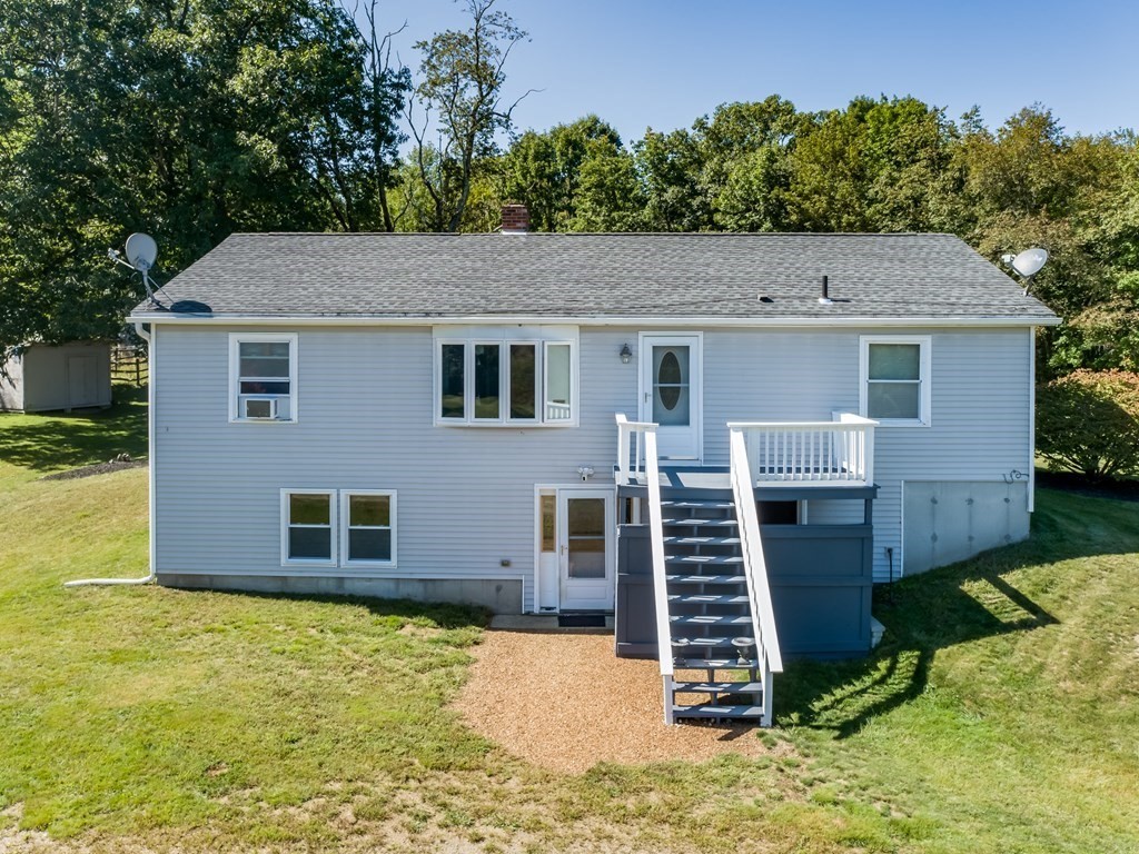 281 Brooks Station Road Princeton, MA 01541 - Photo 3 of 42 a front view of a house with a yard
