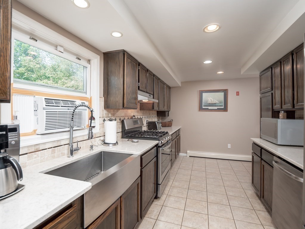 281 Brooks Station Road Princeton, MA 01541 - Photo 4 of 42 a kitchen with a sink stove top oven and refrigerator