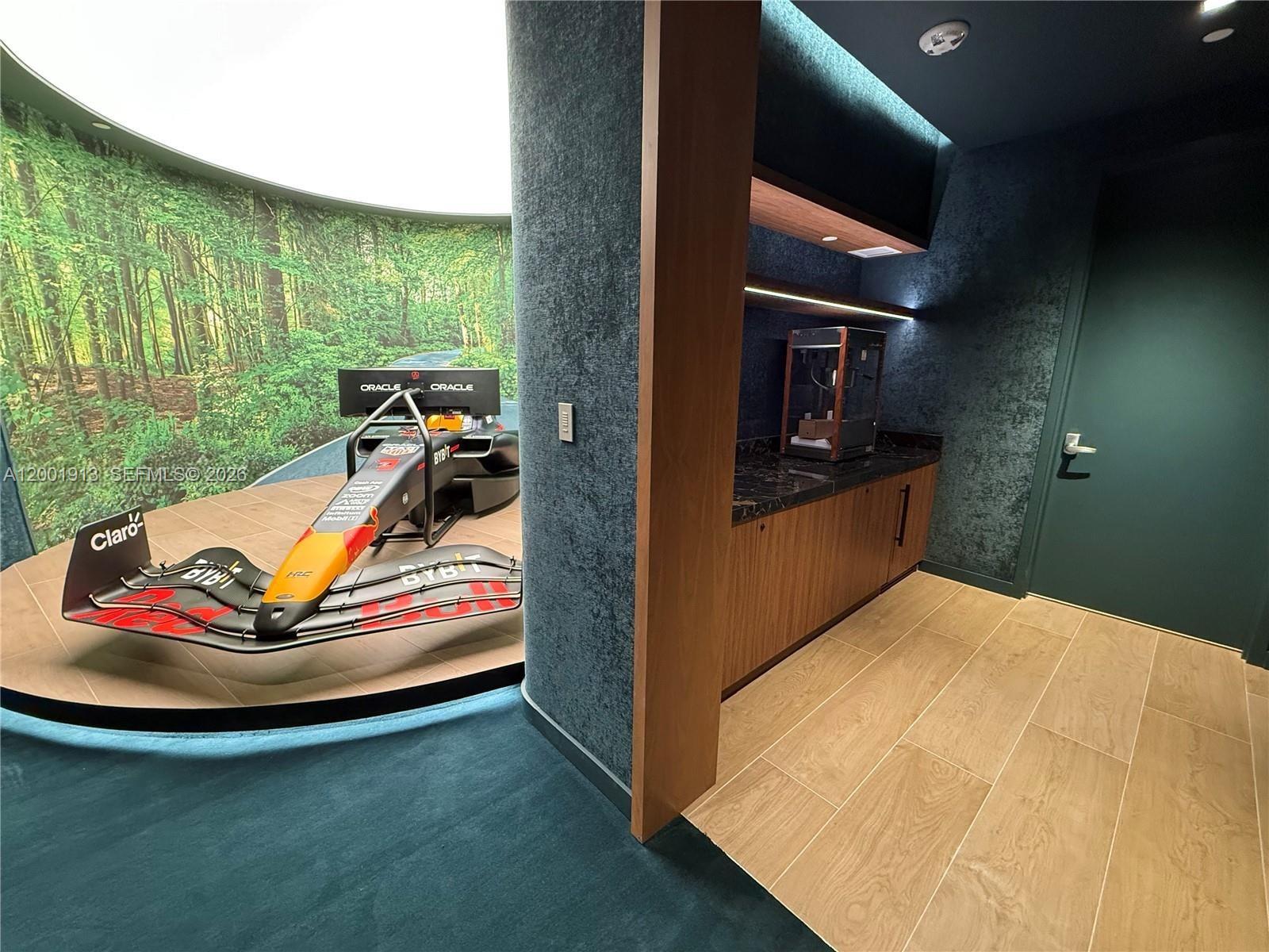 77 Southeast 5th Street, Unit 1007 Miami, FL 33131 - Photo 26 of 31 a bedroom with a bed and a flat screen tv