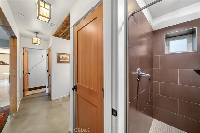 a view of a livingroom with furniture and windows