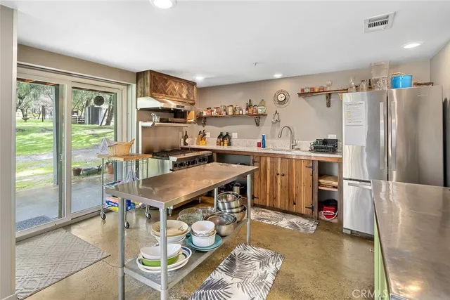 a very nice looking living room with furniture and a wooden floor